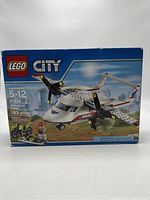 Front view of the Lego City 60116 box showing the ambulance plane and recommended age.