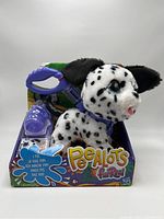 Front view of Peealots FurReal interactive puppy in original packaging with visible branding and accessories.