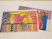 Two vintage psychedelic Peter Max prints with cosmic and pop art themes