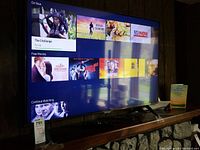 Samsung 42 inch TV powered on showing streaming app interface on screen.