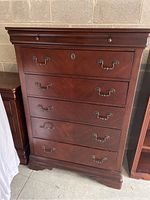 Front view showing overall design, six-drawer configuration, finish and hardware