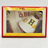 Image of sealed original packaging showing the Muffy Collection Cheerleading set contents through a clear window: megaphone, pennant, pom poms, and trading cards.