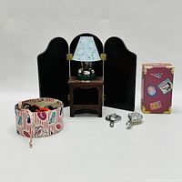 Photo showing entire VanderBear miniature bedroom set including screen, table with lamp, hatbox, shoes, and decorative boxes.