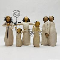Front view of 5 Willow Tree figurines showing individual detailed items from the set.