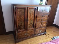Front view of entire dresser showing design, drawers, and doors