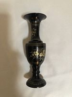 Tall slender etched brass vase, approx. 7 inches high, blackened brass with gold etched floral designs