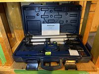 Closed carrying case placed on wooden surface