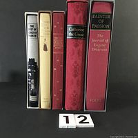 Front view of the 5 vintage hardcover Folio Society books showing titles and spines.