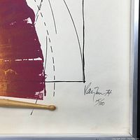Close-up of lower right corner showing Gordon Rayner signature, edition number 15/100 and attached drumstick
