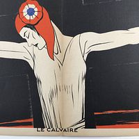 Close-up showing the figure wearing a red hat with a circular rosette detail and the title 'Le Calvaire' below the figure's waist