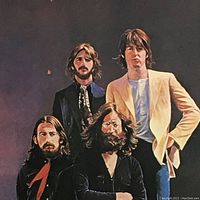 Close-up of the framed print showing the detailed Beatles artwork by Tadanori Yokoo.