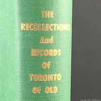 Close-up of book spine with gold title 'The Recollections and Records of Toronto of Old' on green hardcover.