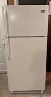Front view of white Frigidaire refrigerator/freezer closed