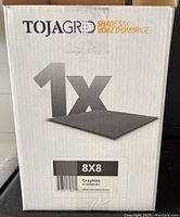 Front of original white box labeled TOJAGRID Shade Sail 8x8 Graphite