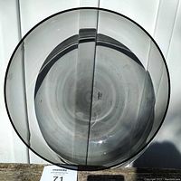 Top view of large smoked glass bowl showing circular shape and color