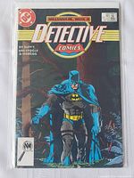Front cover photo of Detective Comics #582 showing Batman in a forest setting with 'Millennium Week 4' and DC Comics logo.