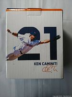 Front of original box showing Ken Caminiti bobblehead image with number 21 and name.