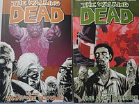 Front covers of two comic books from The Walking Dead series, Volume 10 and Volume 5, showing zombie characters and titles.