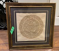 Framed Mayan style art print with Aztec calendar stone design labeled 18x18 inches.