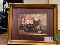 Overall view of the framed floral print art in a gold ornate frame with maroon mat, showing the full composition and condition.