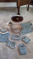 Overview of all items: tray, platter, creamer, coasters and pouches