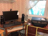 Acer computer setup showing monitor, wired keyboard, Altec Lansing speakers, and HP Envy 5660 printer