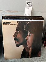 Front cover of Ike & Tina Turner 'Workin' Together' vinyl album showing side profile of both artists.
