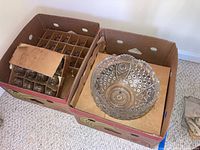 Box of glass cups and the glass punch bowl inside another box, showing the quantity and packaging.