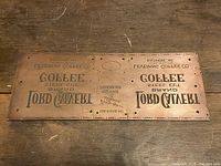 Top side of copper printing plate showing reversed embossed text for Lord Calvert Steel Cut Brand Coffee by Levering Coffee Co Baltimore MD.