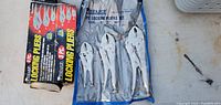 Photo showing three locking pliers in metal finish inside a transparent plastic pouch along with original Pittsburgh locking pliers box packaging.