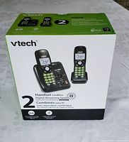 Photo of boxed VTech two cordless handset phone set with digital answering system, caller ID, and call waiting.
