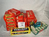 Overall view of all soap bars including stacked Lifebuoy boxes, Sunlight bar, Woodbury 6-pack and Zest soap bar