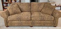 Front view of sofa with two throw cushions in place