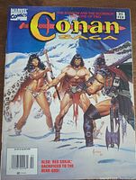 Front cover of Conan the Barbarian issue 219 showing Conan and two other characters in a snowy mountainous setting. Text on cover mentions Red Sonja story.