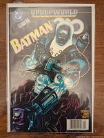 Photo of Batman Underworld Unleashed comic book number 525 from December 1995, showing front cover in protective bag and board.
