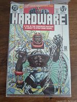 Front cover of Hardware #1 comic book showing the armored character and title.