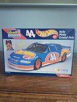 Front view of Revell Monogram Hot Wheels Kyle Petty Grand Prix NASCAR model kit box showing car image, driver photo and branding.