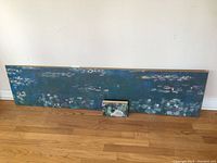 Full shot of large Monet Water Lilies canvas with smaller Bumblebee canvas in front for scale.