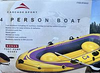 Photo of product box shows branding and product information including 3 air chambers, repair patch, welded oar locks, and max capacity 600 pounds with bonus foot pump and oars.