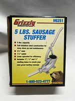 Box of Grizzly 5lbs sausage stuffer showing product details and branding