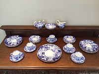 Full view of all pieces arranged on wooden surface