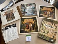 View of two J.R.R. Tolkien 1978 calendars and the puzzle box on table with original shipping box and a Star Trek flyer.