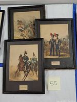 Three framed lithographs of German infantry scenes from 1800s