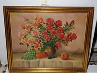 Full view of framed oil painting depicting still life with roses and fruits.