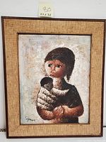 Framed oil on masonite painting of mother holding child with crackled texture and artist signature.