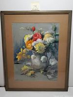 Framed pastel drawing of a floral bouquet in vase, showing entire artwork and frame.