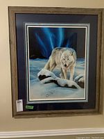 Framed numbered art print of a white wolf in a snowy scene with blue background.