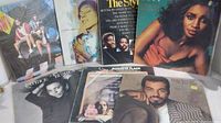 Group photo showing all 7 R&B record albums with visible cover art including James Ingram, Roberta Flack, Patrice Rushen, The Stylistics and others.