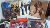 Photo showing a group of 6 vintage vinyl album covers, including The Otis Brothers, Robert Gordon, and others