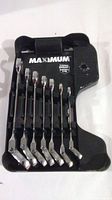 Front view of the complete set of 7 Maximum flexible head wrenches on black plastic holder.